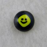 Handmade Fused Glass Tie Tacks with Yellow Smiley Face on a Black glass base
