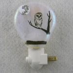 Handcrafted Fused Glass Night light. This one is white iridized with a screen-printed owl decal. Very beautiful. Handcrafted Fused Glass Night light. This one is white iridized with a screen-printed owl decal. Very beautiful.