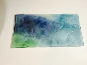 back of fused glass mud and glass glo experiment